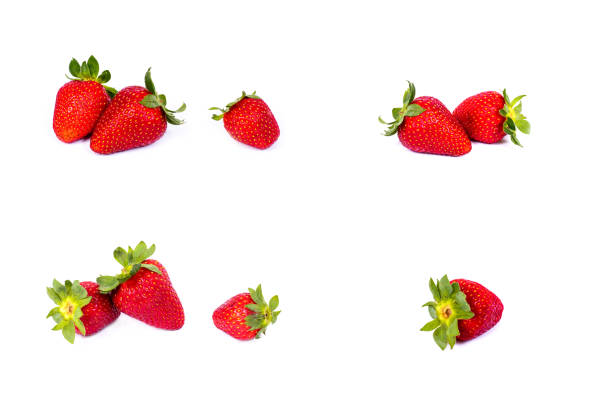 istock Strawberries on a white background. Group of red strawberries on a white background. Fresh and juicy strawberries on an isolated background. 1165387541