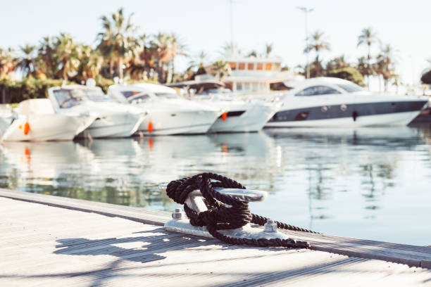 istock Mooring yacht rope tied around a cleat 1165390013