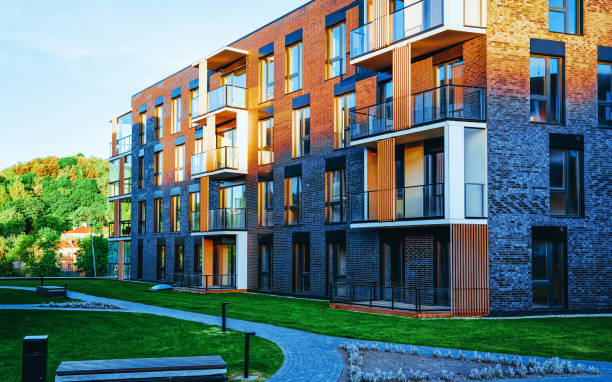 istock EU Modern apartment house building complex outdoor facilities 1165391707