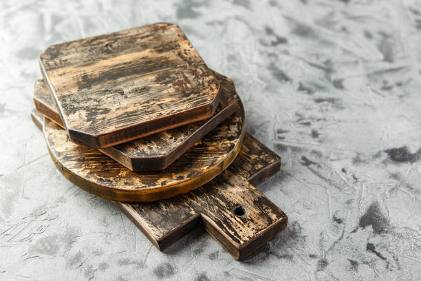 istock Set of different old wooden chopping boards 1165395036