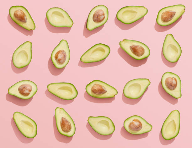 istock Avocados on pink background, Avocado flat lay top view 1165396213