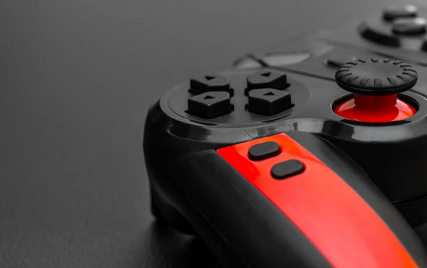 istock Gamepad on black. Close up. Space for text. 1165396387