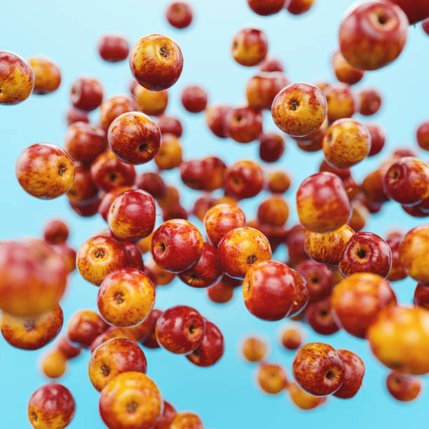 istock Group of flying apples background 1165397912