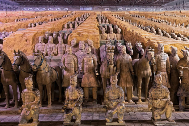 World famous Terracotta Army located in Xian China The world famous Terracotta Army, part of the Mausoleum of the First Qin Emperor and a UNESCO World Heritage Site located in Xian China terracotta stock pictures, royalty-free photos & images