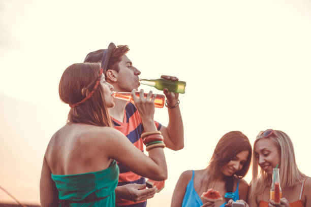 istock Friends at roof party 1165398690