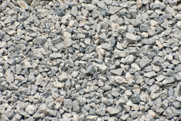 istock Drainage systems from small pebbles. Garden drainage for plants and trees. 1165398918
