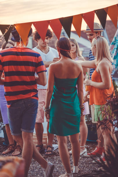 istock Companion at rooftop party 1165399064