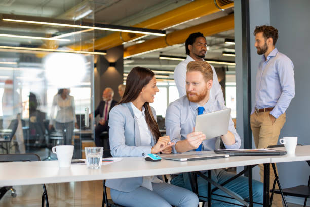 istock Business duo brainstorming the session 1165403626