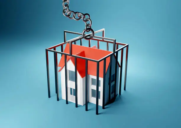 A house trapped in a caged prison. Mortgage, home owner trapped concept. 3D render illustration.