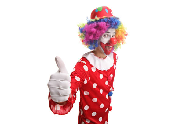 istock Cheerful clown showing thumbs up 1165405530