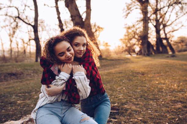 istock Young loving couple in the woods 1165406539