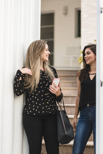 istock Two business women at the gate 1165408647