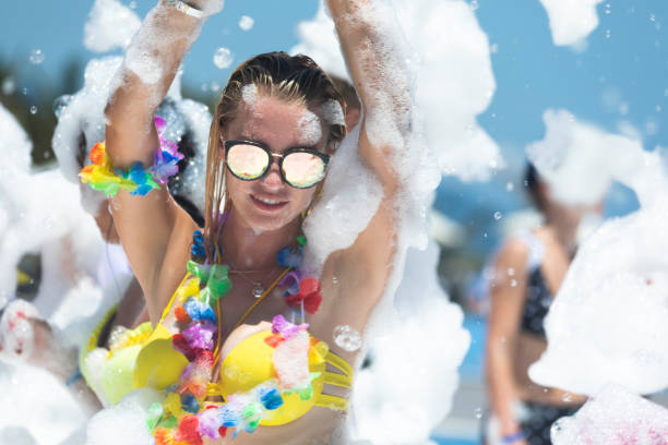 istock Beauty dancing in foamy party 1165408989