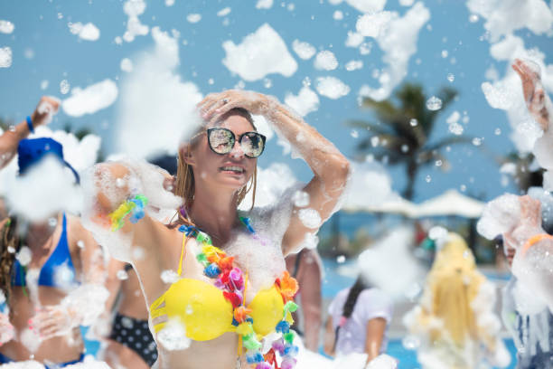 istock Girl enjoys in  foamy party 1165409619