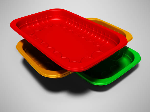 istock Plastic trays of different colors 3d render on gray background with shadow 1165411437