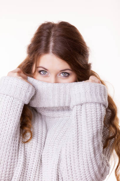 istock Woman feeling comfortable wearing soft sweater 1165418719