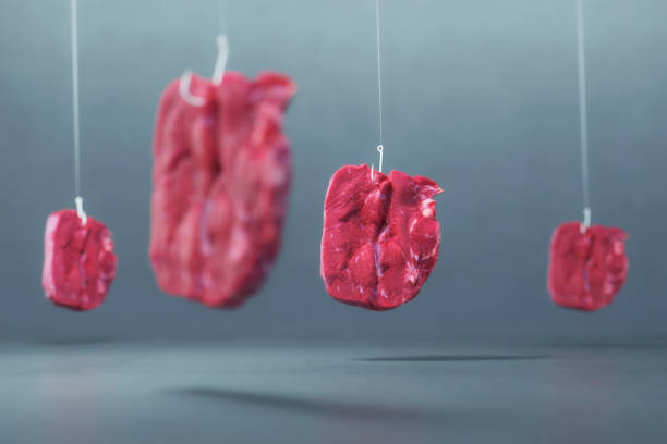 istock Hanging pieces of meat 1165420684