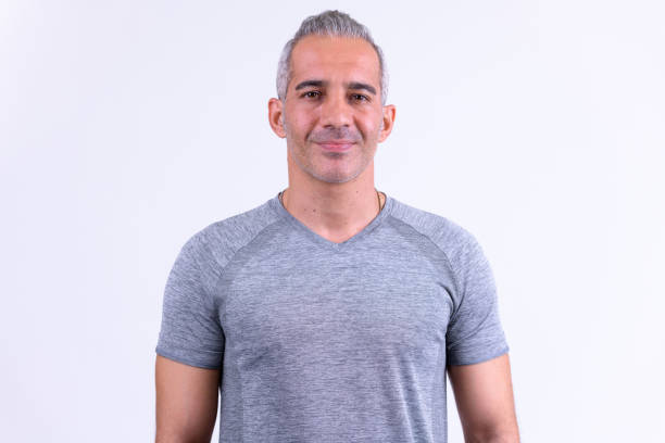 istock Happy Persian man smiling and ready for gym against white background 1165427439