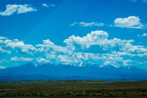 istock snow capped mountains in the distance 1165428250