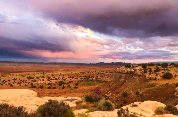 istock pink and purple clouds over the plateau 1165428680