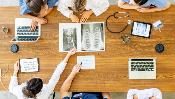 istock Team of doctors working together 1165432216