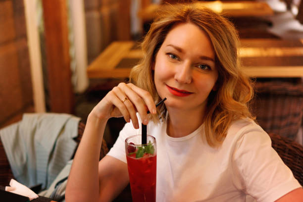 istock Girl in a cafe 1165433052