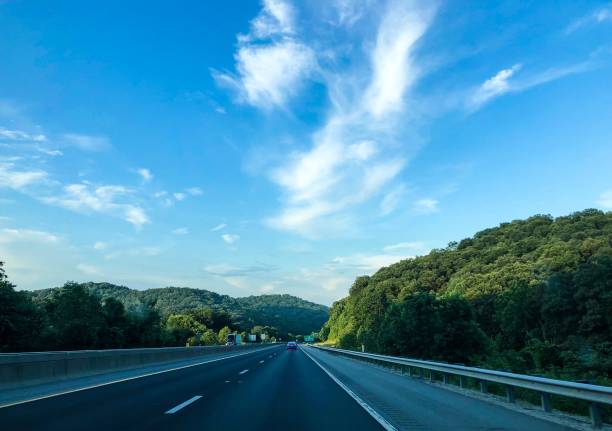 road going through forests in west virginia