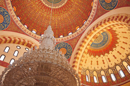 Detail of decorated dome with chandelier at the Mohammad Al-Amin Mosque. Beirut. Lebanon.