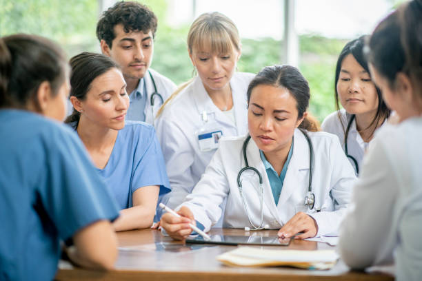 istock Medical team works together to learn and research. 1165434048
