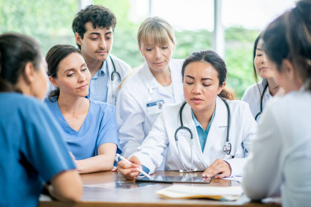 istock Medical team works together to learn and research. 1165434052