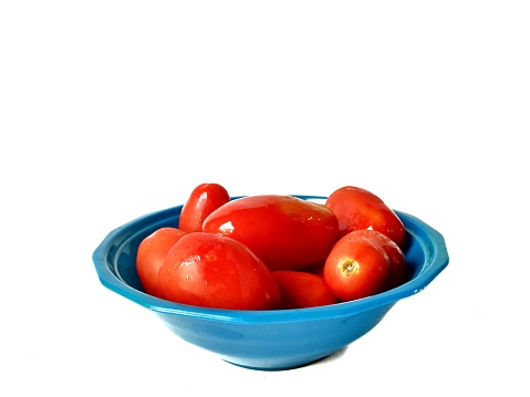 Organic tomatoes ready for the sauce with white background. pizza ingredient