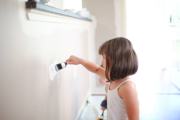 istock Children Painting 1165440074