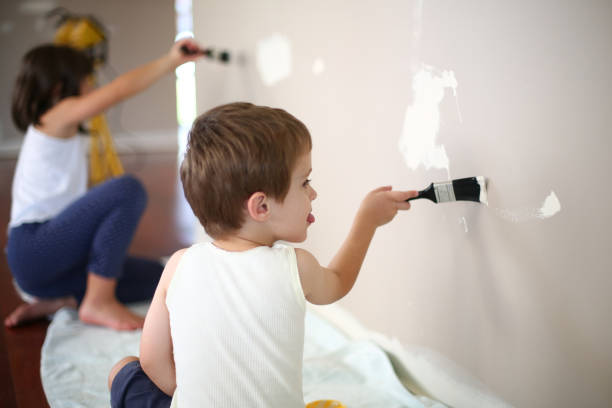 istock Children Painting 1165440136