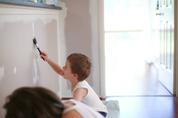 istock Children Painting 1165443250