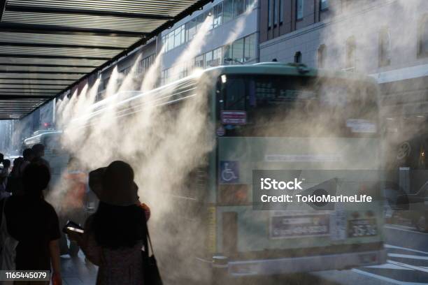 Fresh Mist Shower At Shijo Takakura Bus Stop On Hot Summer Days Stock Photo - Download Image Now
