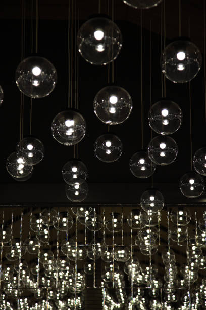 istock Original Luxury decorative lighting in the restaurant. Lamps decorated on ceiling. 1165448464