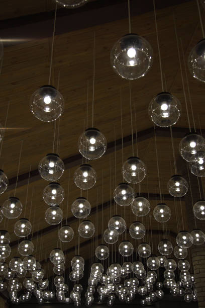 istock Original Luxury decorative lighting in the restaurant. Lamps decorated on ceiling. 1165448477