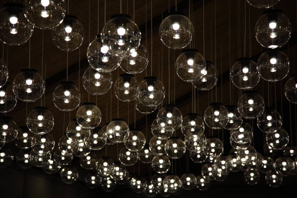 istock Original Luxury decorative lighting in the restaurant. Lamps decorated on ceiling. 1165448517