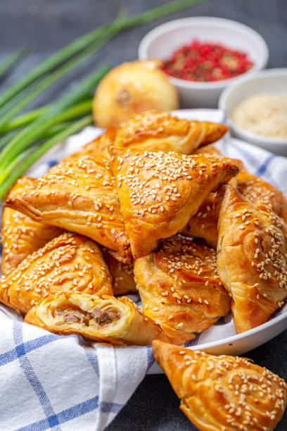 istock Homemade samosas sprinkled with sesame seeds. 1165458593