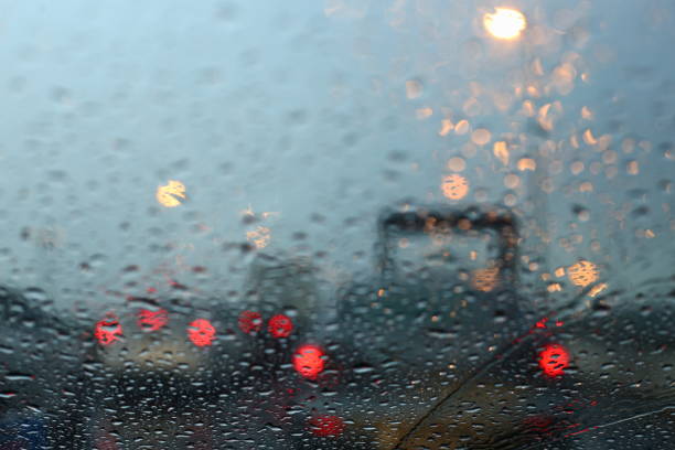istock raffic jam due to rain storm. unproductive hour commuting. 1165459536