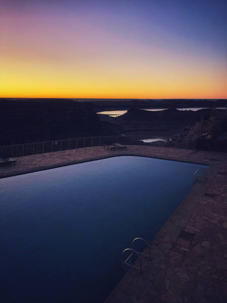 istock Retro Swimming Pool at dawn 1165459577
