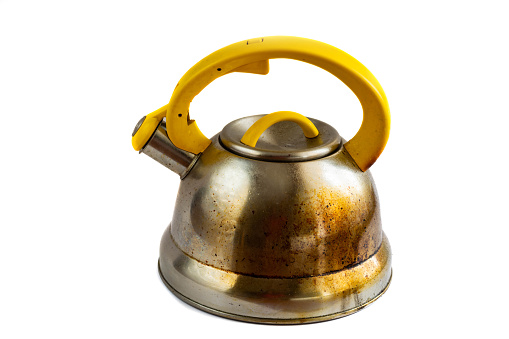 isolated on white background dirty greasy whistling kettle
