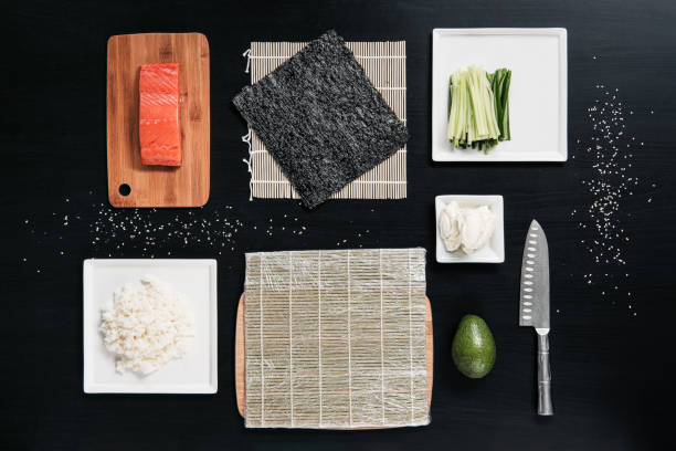 ingredienti per sushi e panini. pesce rosso, avocado, crema di formaggio. - temaki food sushi salmon foto e immagini stock
