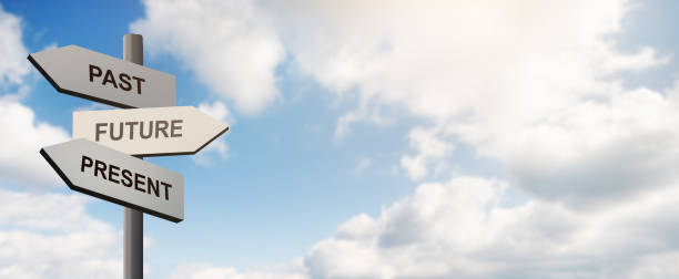 istock Pointer with arrows in front of blue sky with clouds 1165467156