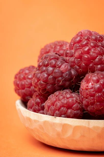 Macro view of red ripe raspberry fruits