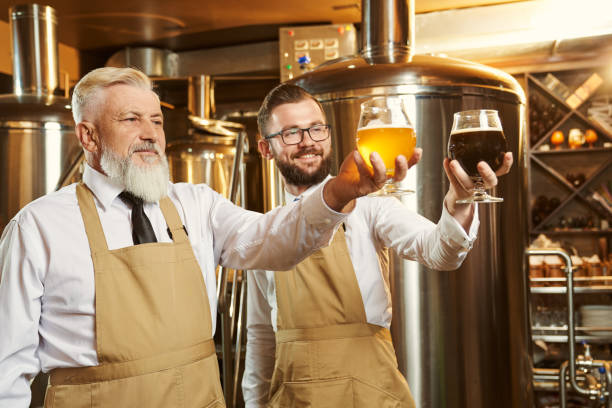 istock Specialists looking at glasses of beer. 1165468014