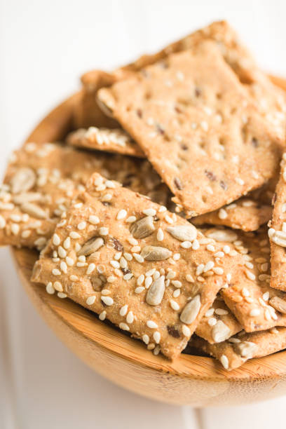 istock Salted crispy crackers with sesame and sunflower seeds 1165469318