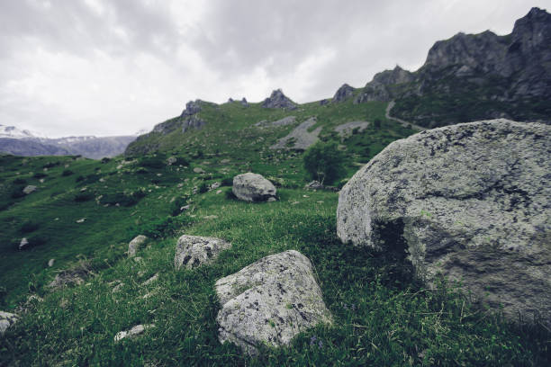 istock Mountain landscape with snow-capped mountains on horizon 1165471726