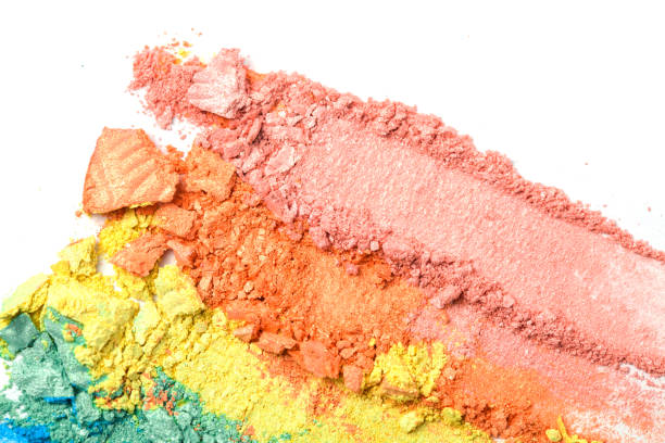 istock A broken rainbow colored eye shadow smear, make up palette isolated on a white background. 1165473861