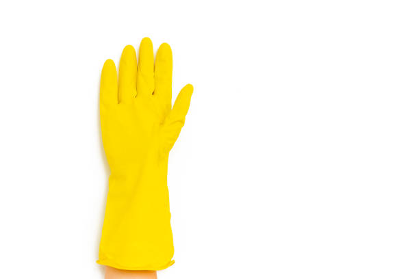 istock Hand in a rubber glove for cleaning on a white background isolation 1165478681